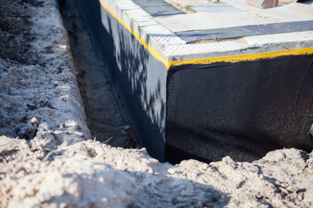 Professional Waterproofing technician working in Pittsboro, IN